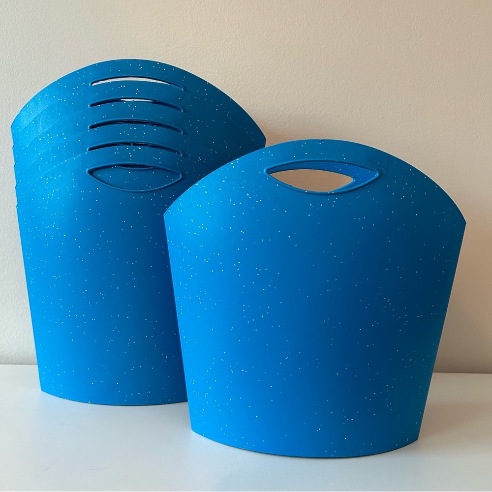Set of six blue caddies; great for group project materials. EUC